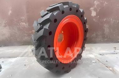 Neumático macizo ATLAPEX 23X8.5-12 AT-SKS: El compañero ideal para la Bobcat S70 en entornos difíciles.