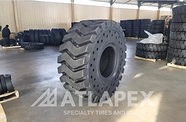 Neumáticos macizos ATLAPEX 23.5-25 AP-LMAX para uso fuera de carretera: Máxima resistencia para maquinaria pesada.