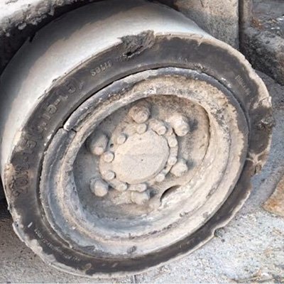 Soild Press- on tire working in the field 