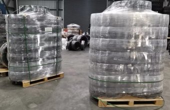 The process of ATLAPEX Solid skid steer tire mounting on rim for bobcat, CAT, case skid steer