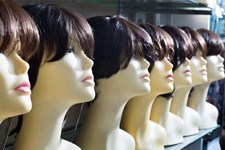 The difference between the mannequin head made of fiberglass and the mannequin head made of pvc