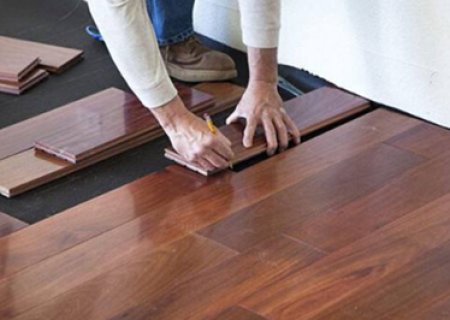 What materials are used for soundproofing pads under floors?