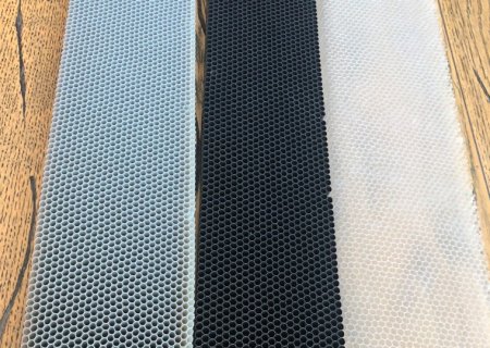 Round-Cell PC Honeycomb vs. Hexagonal PVC Core： Which Works Better for Display Cabinet Air Guide Strips? 